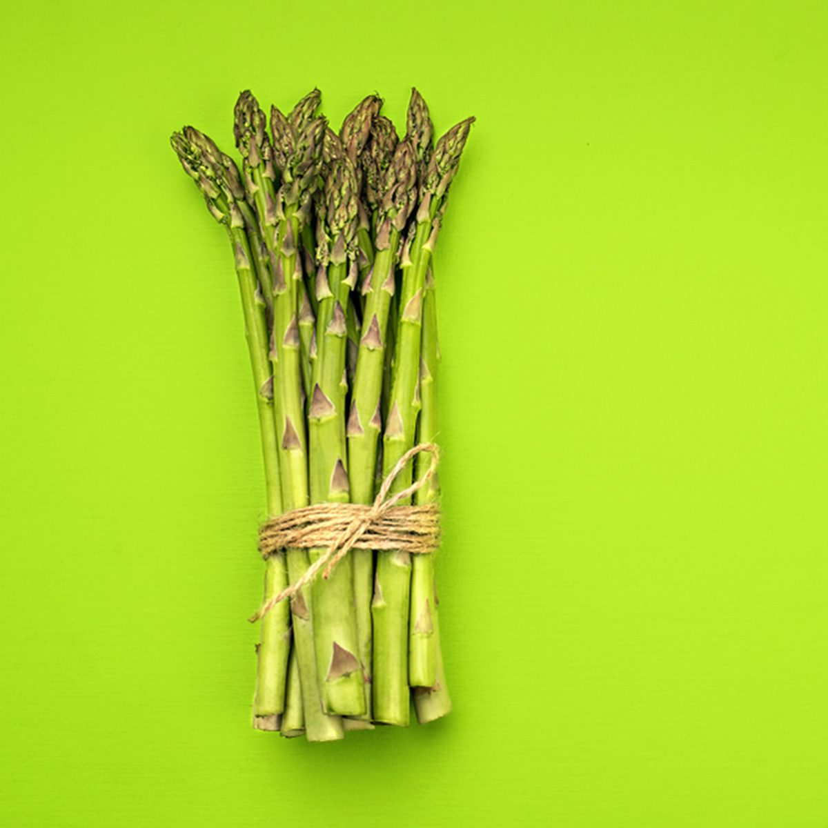 Food background asparagus flat lay pattern.